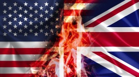 Stock Image: USA vs UK United Kingdom GB Great Britain burning Flag - conflict war comparison on fire illustration
