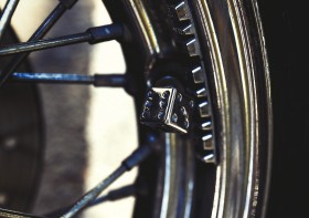 Stock Image: valve dice motorcycle wheel