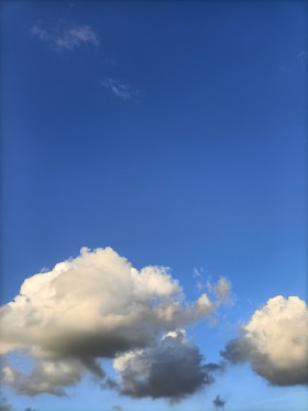 Stock Image: Verical Sky with some Clouds for Sky Replacement