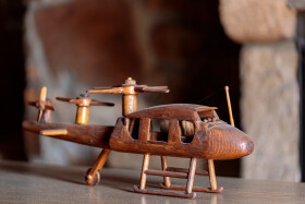 Stock Image: Vintage Delight: Antique Wooden Toy Helicopter