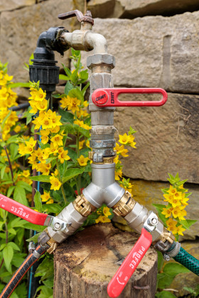 Stock Image: Water pipe in the garden