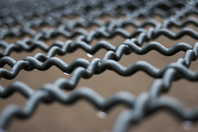 Stock Image: wet abstract metal grid