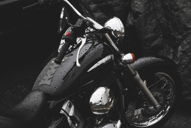 Stock Image: wet motorbike in rain