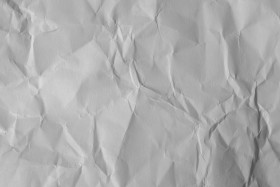 Stock Image: White crumpled paper background