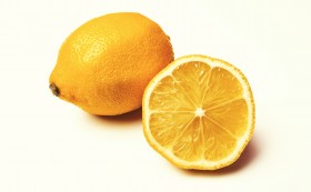 Stock Image: whole lemon and sliced lemon