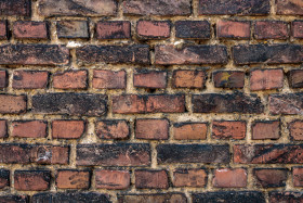 Stock Image: wide zoomed red old brick wall texture