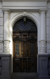 Stock Image: wooden door old white house