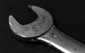 Stock Image: wrench black background