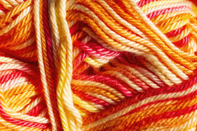 Stock Image: yellow and red tones wool background
