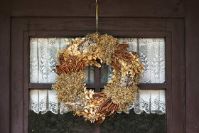 Stock Image: yellowish door wreath