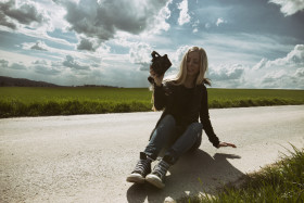 Stock Image: young girl with camera - female photographer