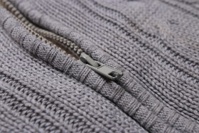 Stock Image: Zipper on Grey Wool Jacket for Kids